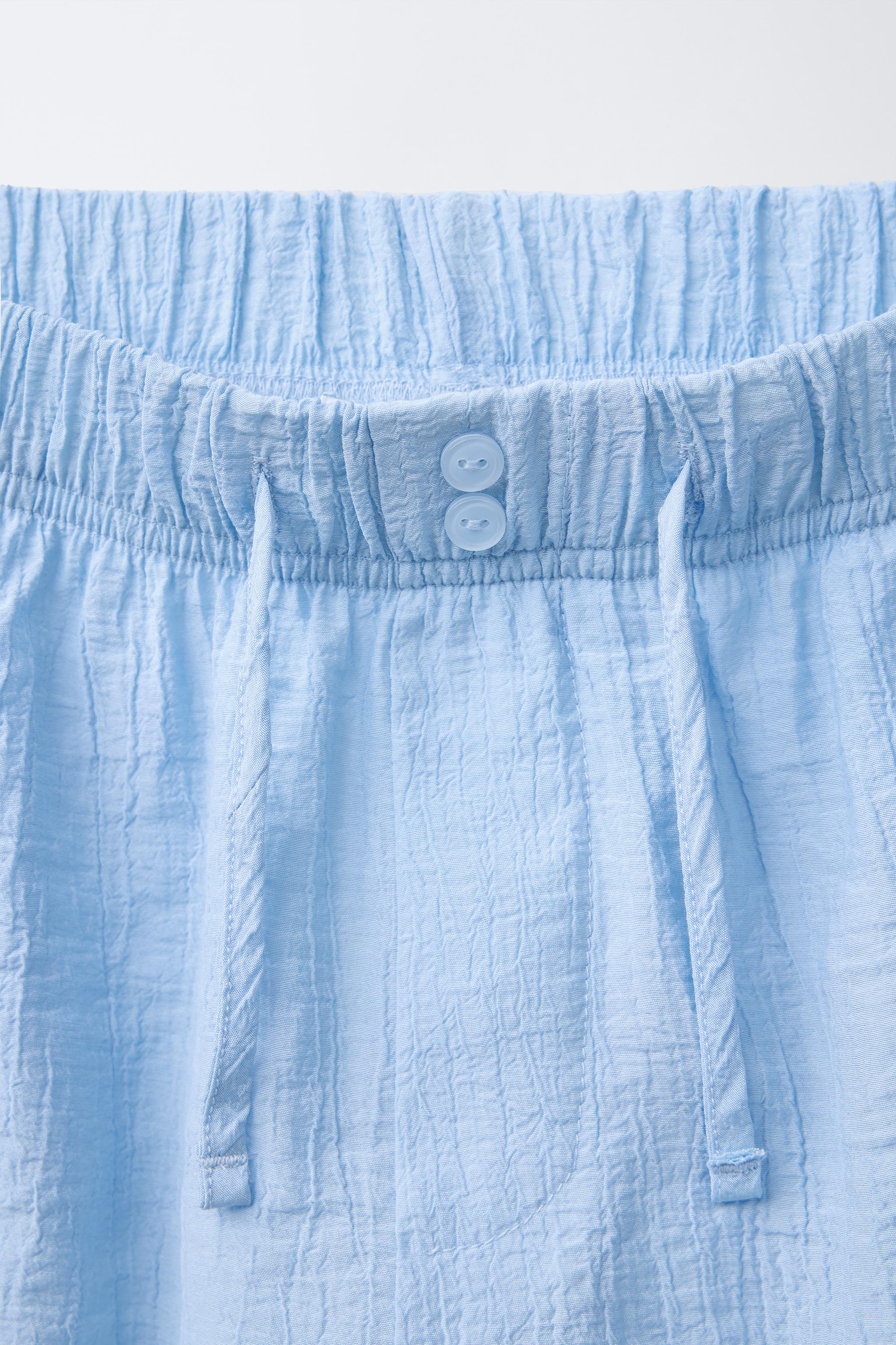 PANTALON À JAMBES LARGES EFFET FROISSÉ